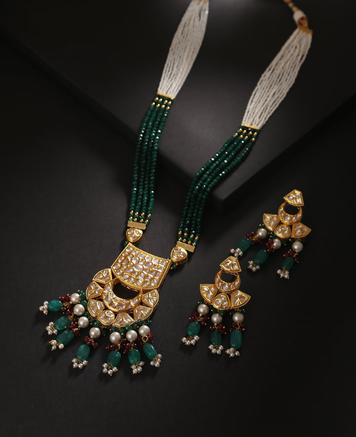 Minaki Long Kundan Set with Emerald colored Beads